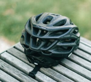 Black cycle helmet on table